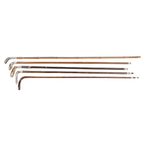 Five silver mounted golf club 'Sunday' walking canes