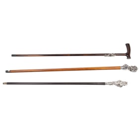 Three silver plate mounted erotic walking canes
