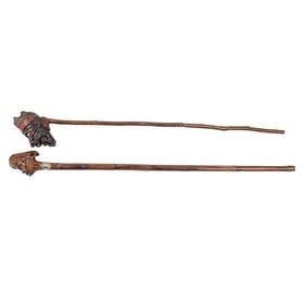 Two Folk Art carved wood caricature walking canes