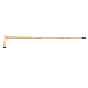An Indonesian engraved bone walking cane