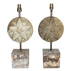 A pair of iron architectural element of stars