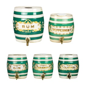 A set of four German ceramic spirit barrels made for the English market