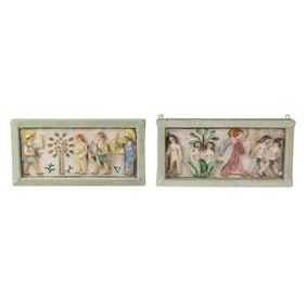 A pair of Italian majolica relief tiles depicting the Creation Narrative of Adam and Eve