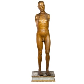 An Italian carved wood figure of a man
