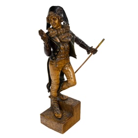 A Continental polychrome carved wood figure of a dandy