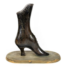 A large Victorian wood shoe with pique metal inlay