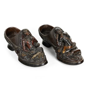 A pair of Continental carved oak wood shoes or heeled clogs