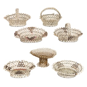 Seven Mexican souvenir cowrie shell baskets