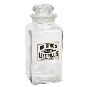 A glass advertising apothecary jar: Dr. King's New Life Pills