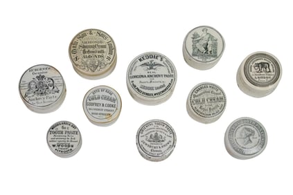 Ten English ironstone advertising pomade boxes