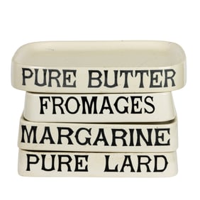 Four English ironstone advertising display stands
