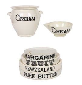 A group of English ironstone round advertising display stands