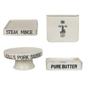 A group of English ironstone advertising display stands