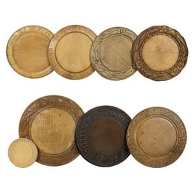 Eight English carved wood bread boards