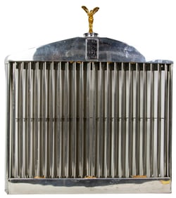 A Rolls Royce car grill with Spirit of Ecstasy hood ornament