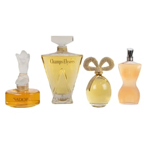 Four factice or dummy perfume bottles