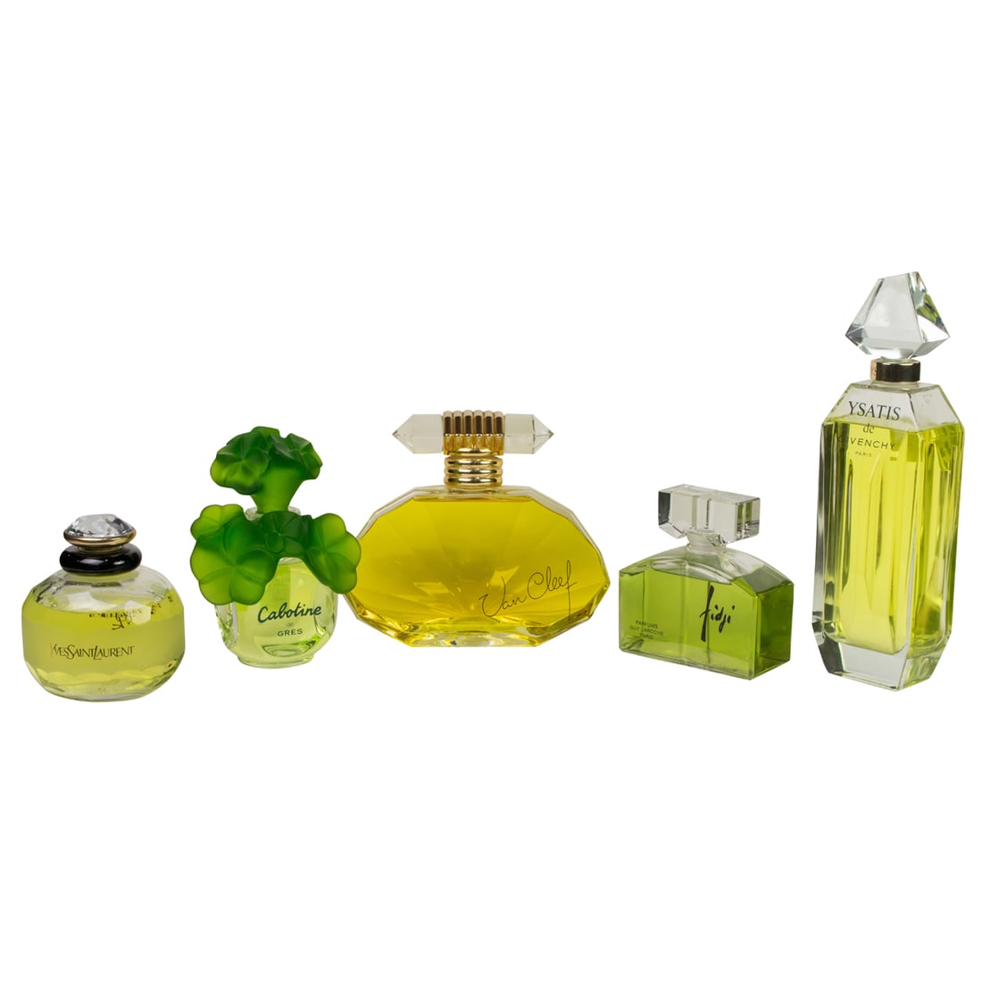 Five factice or dummy perfume bottles: Five factice or dummy perfume bottles, comprising 'Ysatis' by Givenchy, 15.5"h; 'Fidji' by Guy Laroche, 6.75"h; Van Cleef & Arpels, 9.5"h; Cabotine de Gres, 9.25"h and 'Paris' by Yves Saint Laurent, 6