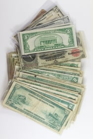 A lot of fifteen Peace dollars