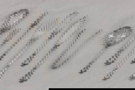 A Gorham Chantilly partial sterling flatware service: A Gorham Chantilly partial sterling silver flatware service: (8) salad forks; (6) seafood forks; (7) solid silver butter spreaders and a master butter spreader; (4) small serving pieces, total