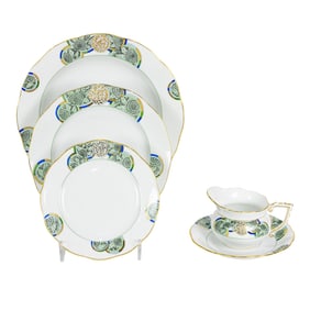 A partial Herend porcelain dinner service in a medallion pattern