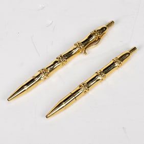 A Tiffany & Co 14 karat gold 'Bamboo' pen set