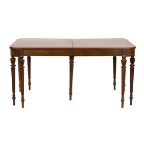 A Hepplewhite style walnut dining table with three leaves in crate and felted cover