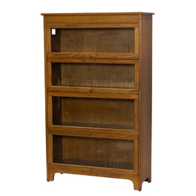 An oak barrister style bookcase