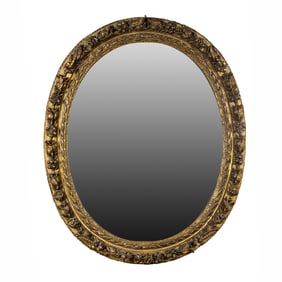 A Neoclassical style oval giltwood mirror