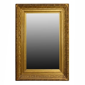 A large European giltwood and gesso rectangular mirror