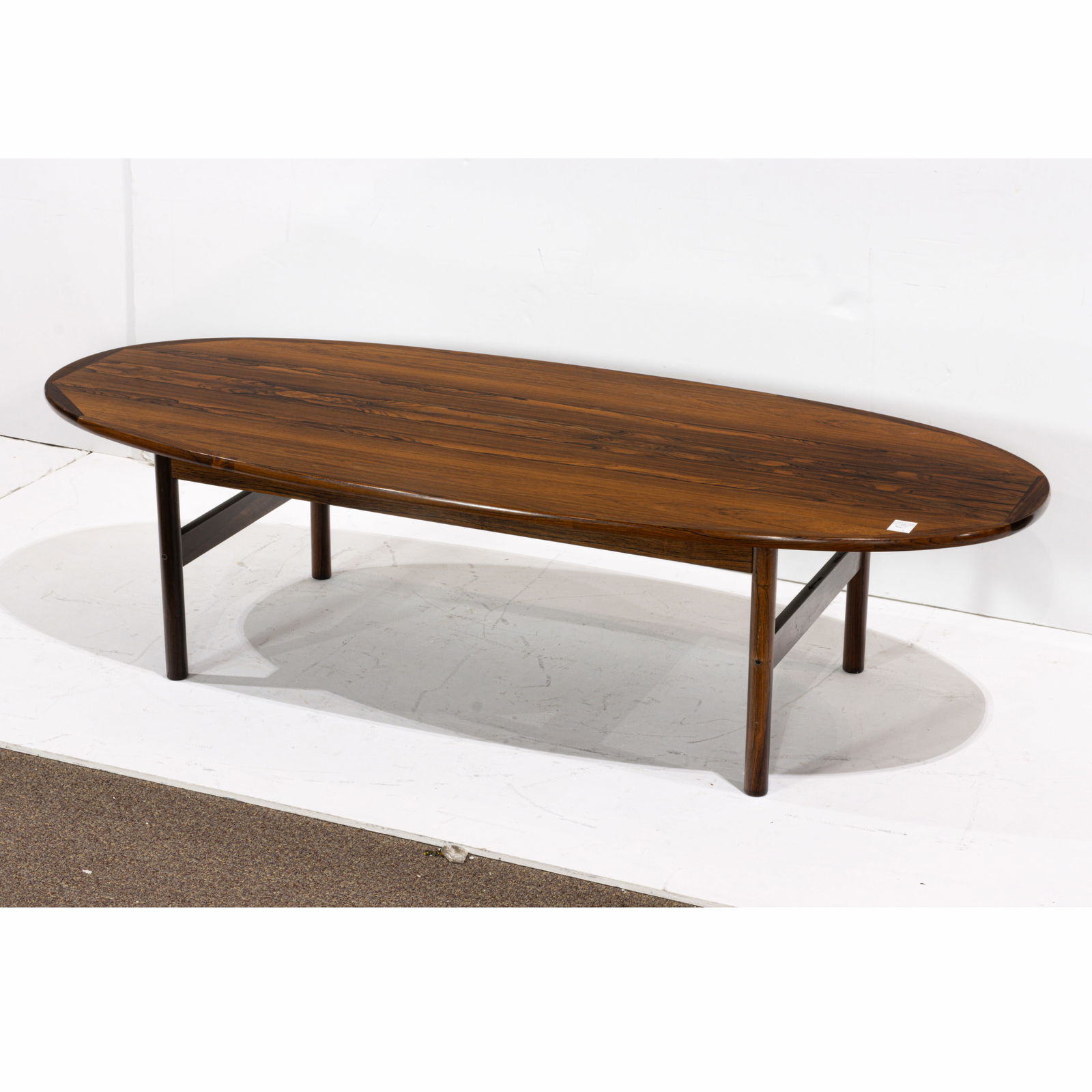 A Mid-Century rosewood surfboard table (1 of 4)