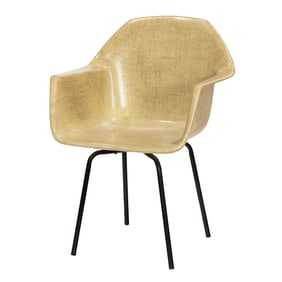 A Charles and Ray Eames attrib. shell form fiberglass lounge chair in burlap