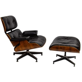 A Charles and Ray Eames 670 and 671 lounge chair and ottoman