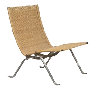 A Poul Kjaerholm wicker and steel PK 22 lounge chair