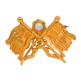 A high karat gold and opal brooch