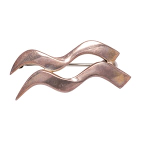 A Tiffany and Company silver paloma picasso brooch
