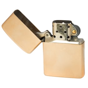 A 14k gold Zippo Lighter