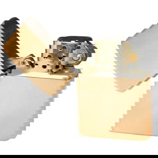 A 14k gold Zippo Lighter: A 14k gold Zippo Lightergold weight: 42.33 grams; 69.00 grams gross; length: 2 1/8 in