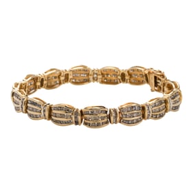 A diamond and 14k gold link bracelet