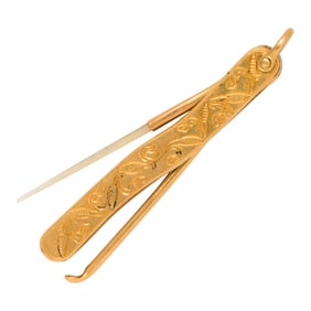 A Chinese high karat gold hygiene accessory