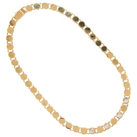 A diamond and 14k gold necklace
