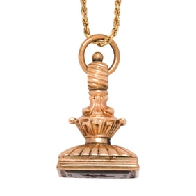 An antique bloodstone and 14k gold intaglio fob pendant and chain