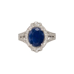 A sapphire, diamond and platinum ring