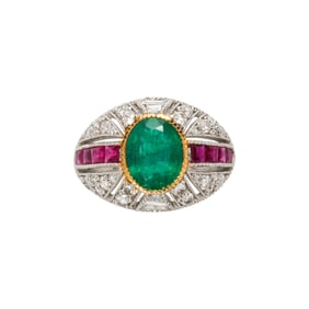 An emerald, ruby and diamond and platinum ring