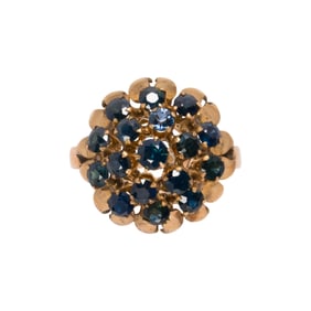 A synthetic sapphire and 14k gold princess ring