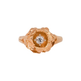 A diamond and 14k gold ring