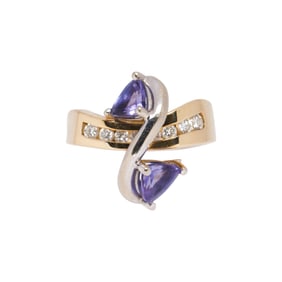 A tanzanite, diamond and 14k gold ring