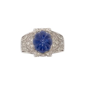A sapphire, diamond and 14k white gold ring