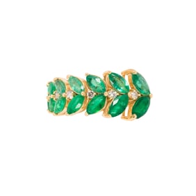 An emerald, diamond, and 18k gold ring