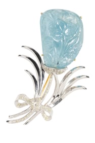 An aquamarine, diamond and silver brooch