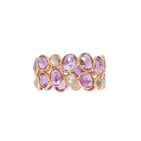 A sapphire, diamond, and 18k gold ring